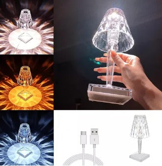 Lámpara de cristal LED recargable con elegantes proyecciones de luz en diferentes tonos, incluye cable USB para cargar.