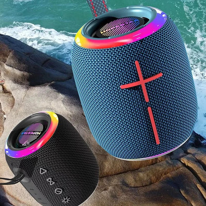 Mini altavoz portátil